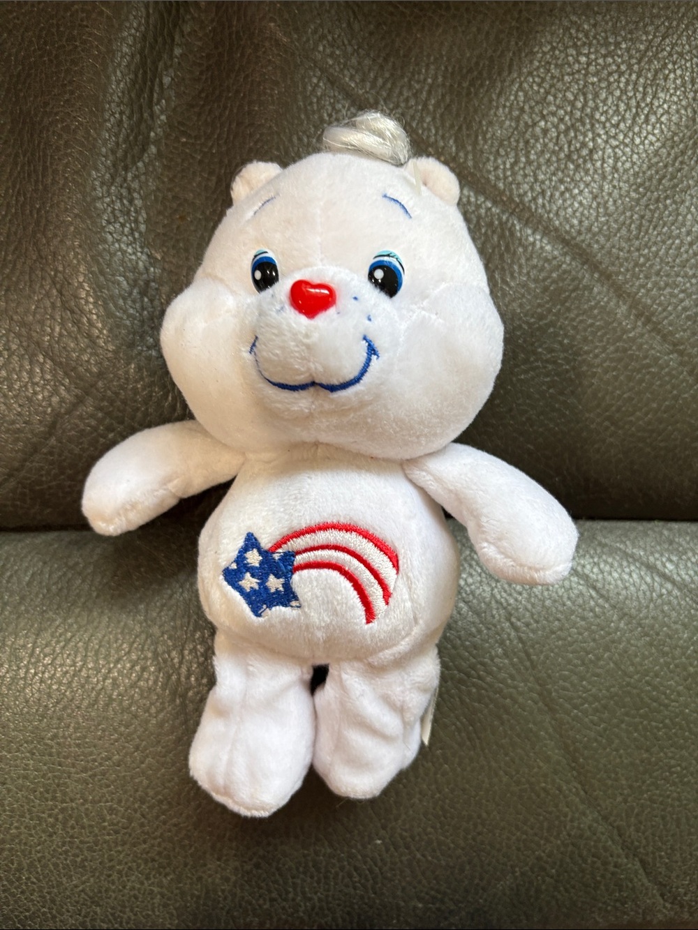 Carebear white plush with red white and blue